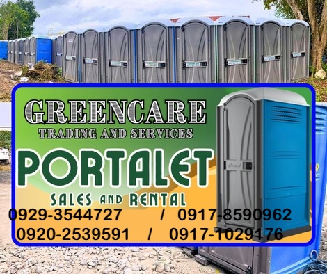 A row of portable toilets with a sign for Greencare Portalets, offering sales and rental information, along with contact numbers. portalet